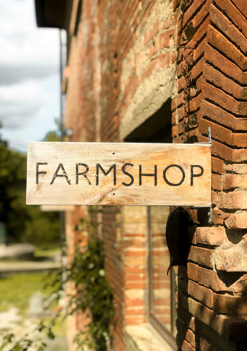 Custom wood sign on a wall