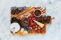 Charcuterie board with cheese and fruit