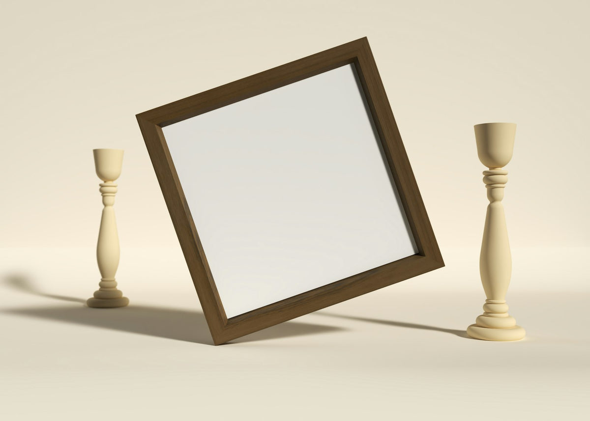 Picture frame on a table with candles