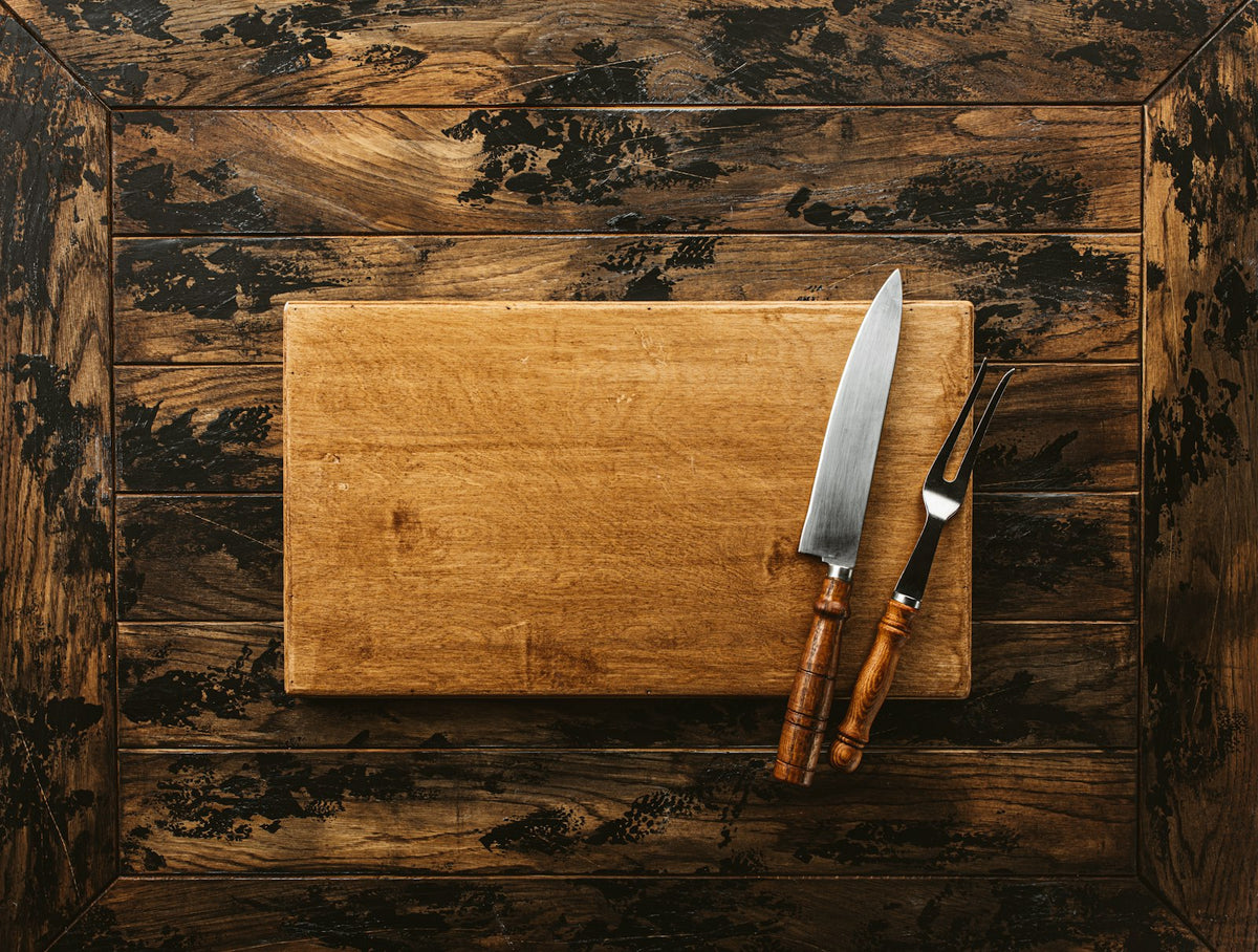 Butcher block cutting board with knife