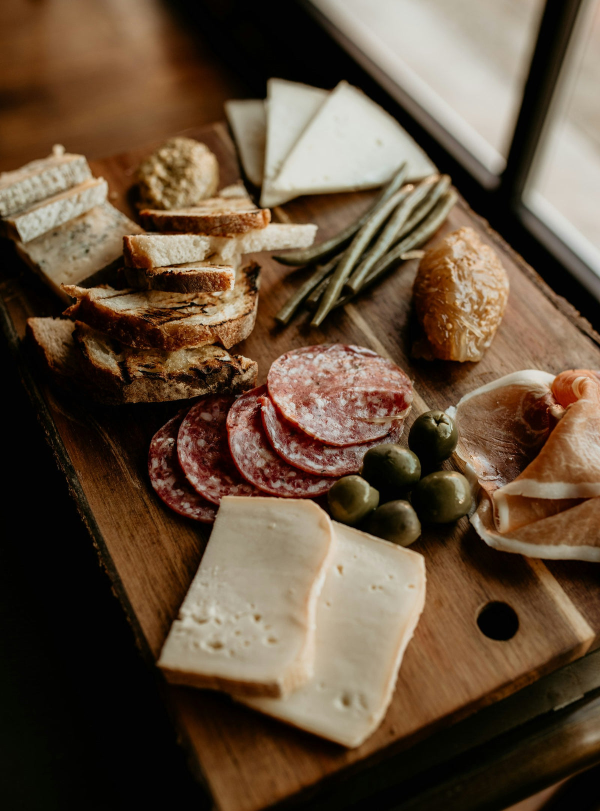 Wood serving board with food